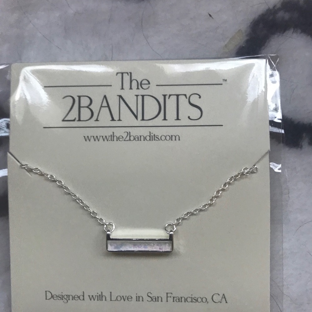The 2 Bandits necklace NEW in package